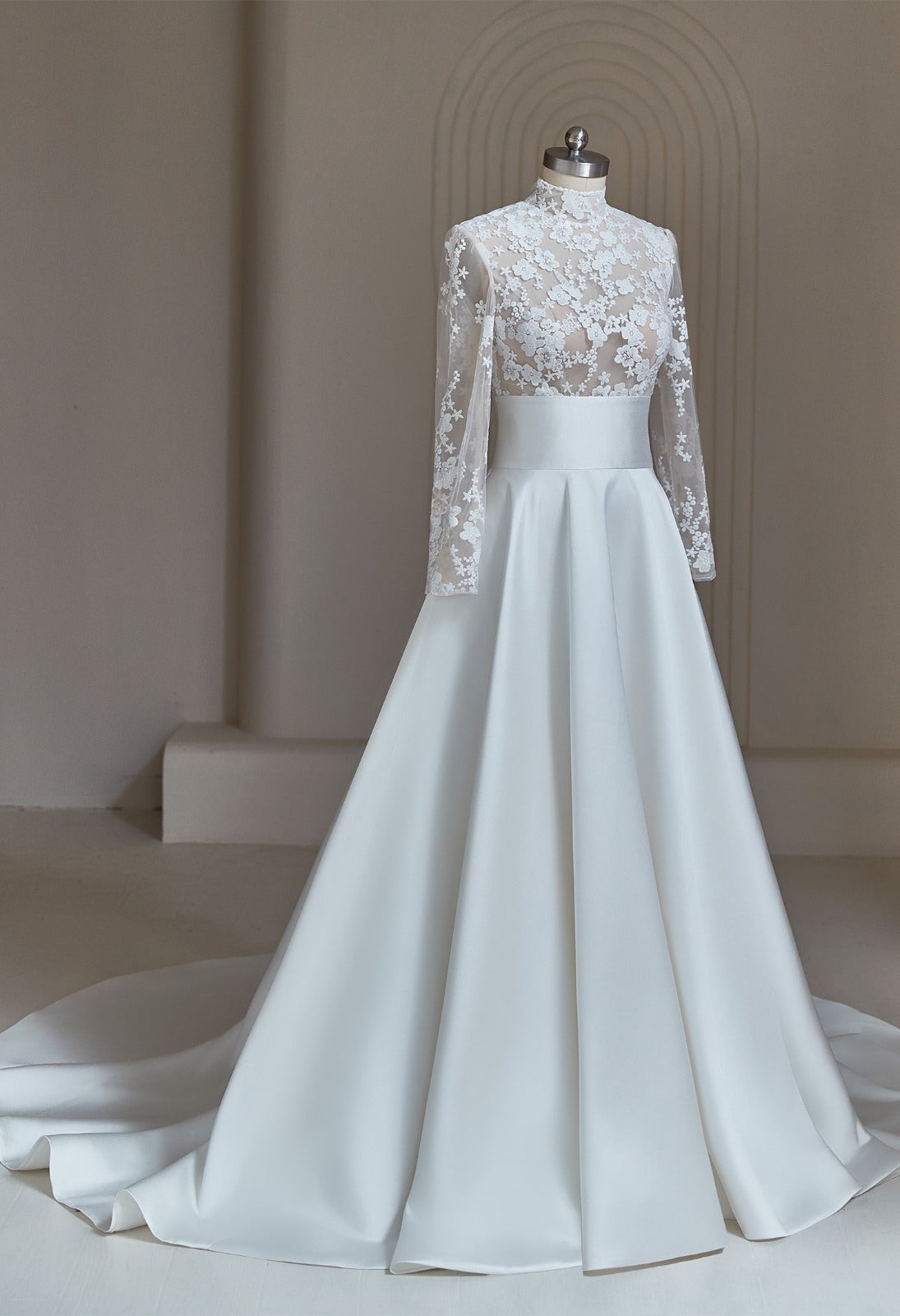 Elegant long sleeve lace wedding gown with wide Mikado waistband and full satin skirt