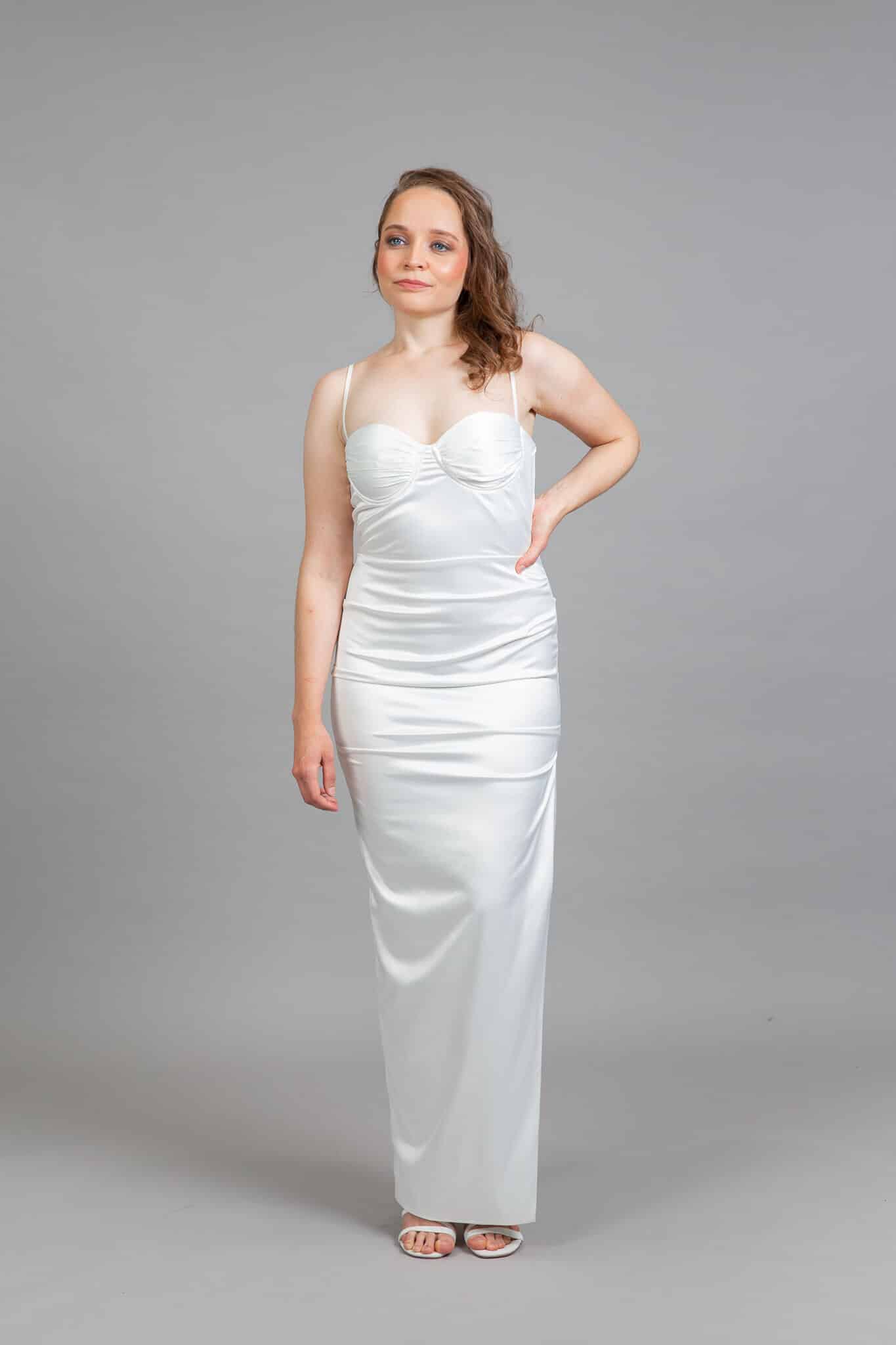 White silk wedding dress with sweetheart neckline and ruched bodice, full-length front view – Art Kollocsion Auckland