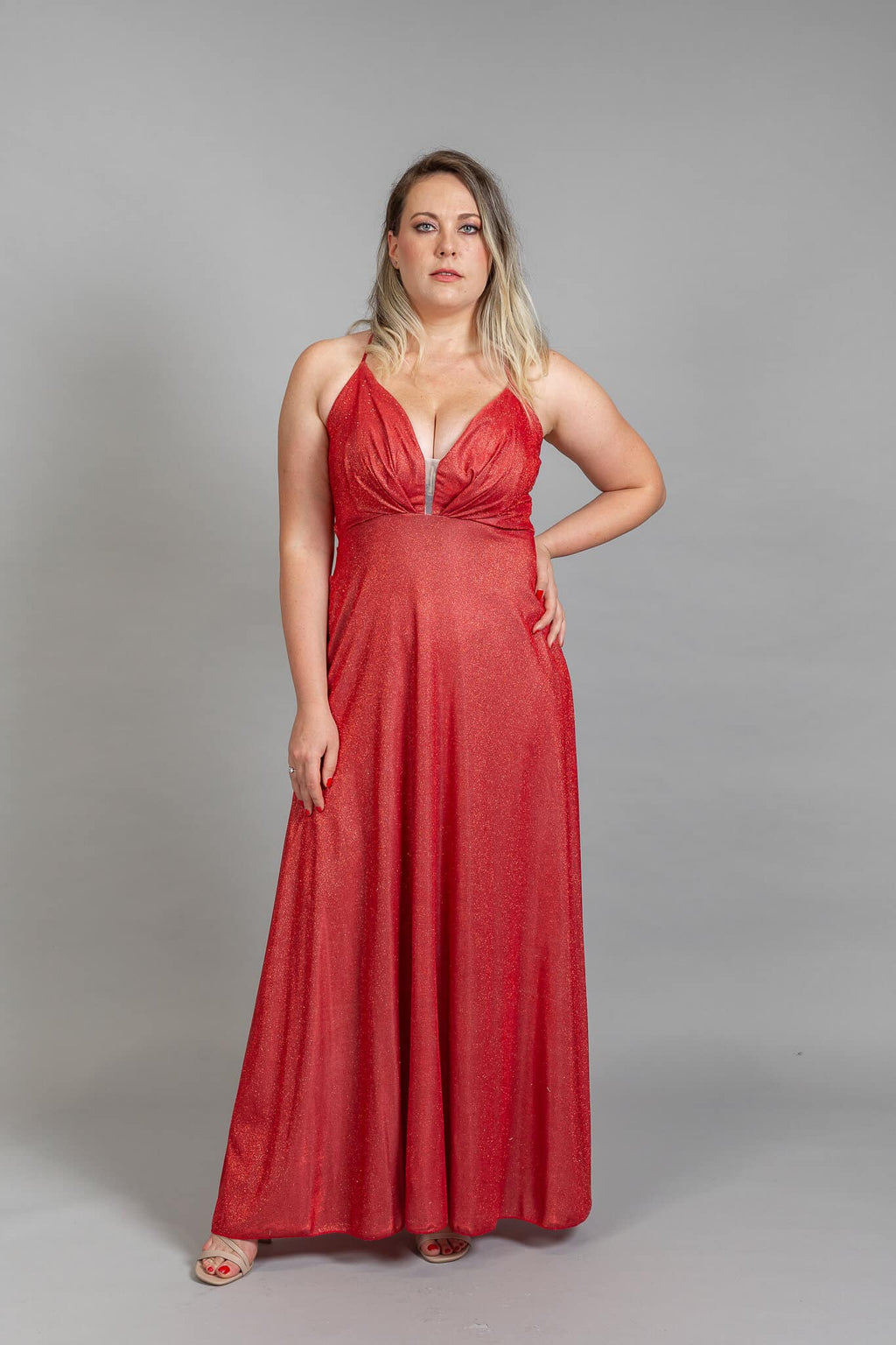Red glittery evening gown with deep V-neckline and flowing A-line skirt – Art Kollocsion Auckland