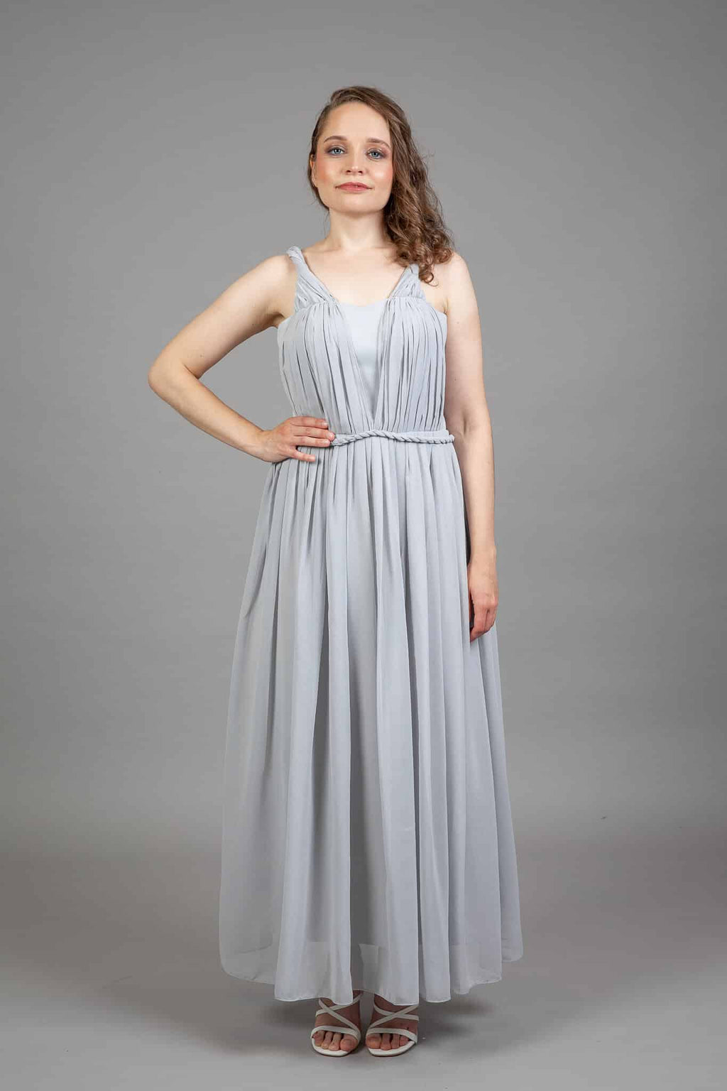 Light grey chiffon dress with pleated V-front bodice, braided rope waist and gathered maxi skirt, front view