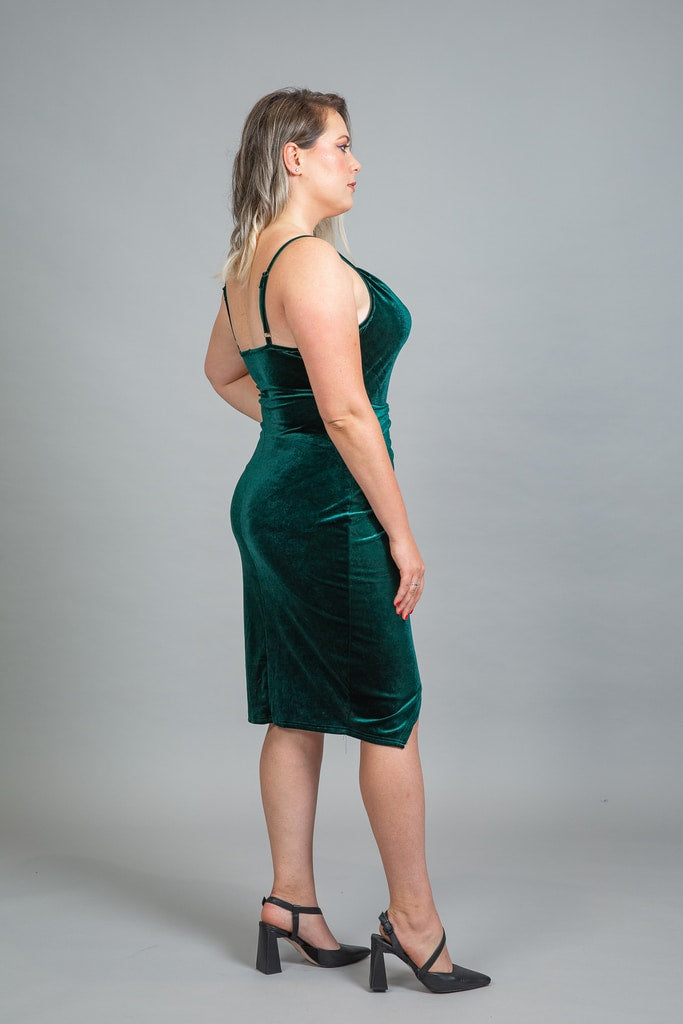 Teal velvet cowl neckline dress, side view showing back straps and fitted silhouette
