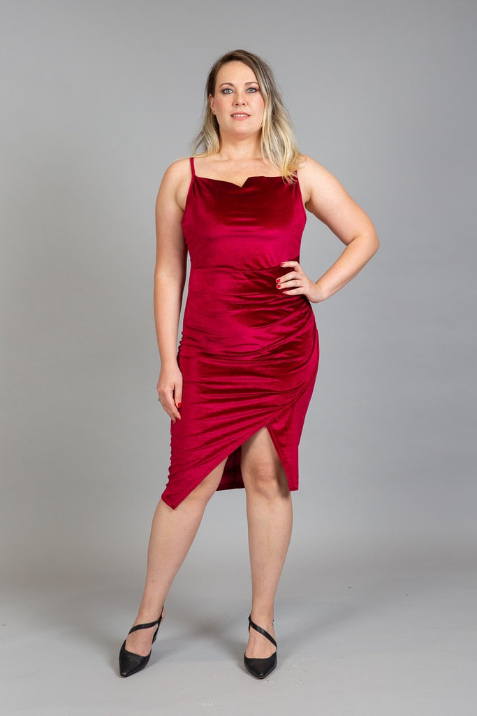 Deep red velvet cowl neckline wrap dress with curved hemline, front view