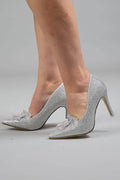 Silver Diamond Heels with glittery finish and crystal toe embellishments on model – Art Kollocsion Auckland
