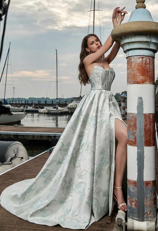 CK3411 wedding dress side profile showcasing high slit, floral-printed satin train, and A-line silhouette
