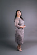 Taupe mother of the bride dress with wavy swirl pattern, three-quarter sleeves, side view – Art Kollocsion Auckland