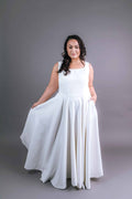 White sleeveless wedding gown with scoop neckline and A-line skirt – Art Kollocsion Auckland