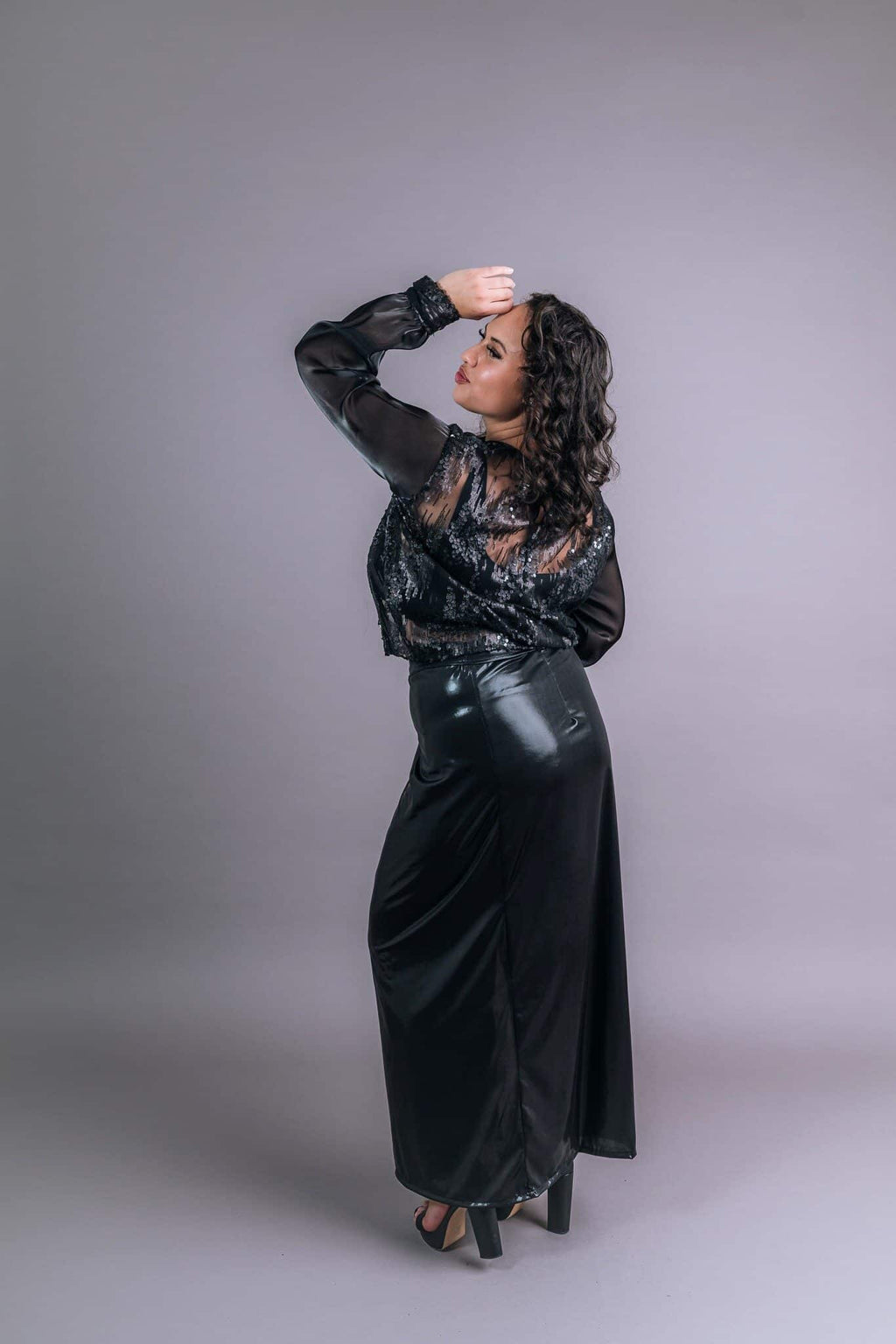 Black sequined top and satin skirt from rear three-quarter view – Art Kollocsion Auckland