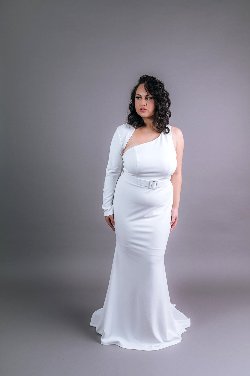 Elegant bridal gown in boutique showroom
