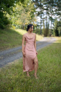 Dusty pink satin Cowl Neck Bridesmaids Dress with leg split, model walking outdoors – Art Kollocsion Auckland