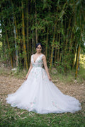 Front view of Green Forest Wedding Gown with blush floral embroidery and sage trim – Art Kollocsion Auckland