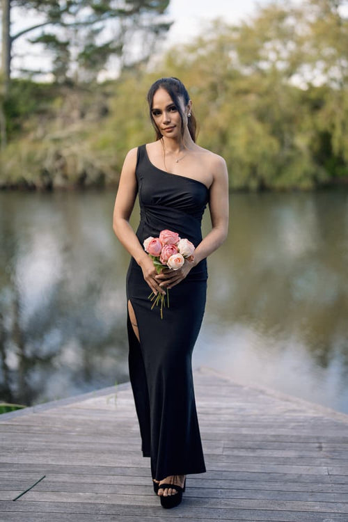 Bridal gown with elegant fitted bodice and train