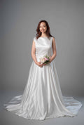 Model in white satin boat neckline A-line wedding dress with sweep train, front view – Art Kollocsion Auckland