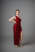 Burgundy one-shoulder sequin dress with high slit, worn front view – Art Kollocsion Auckland