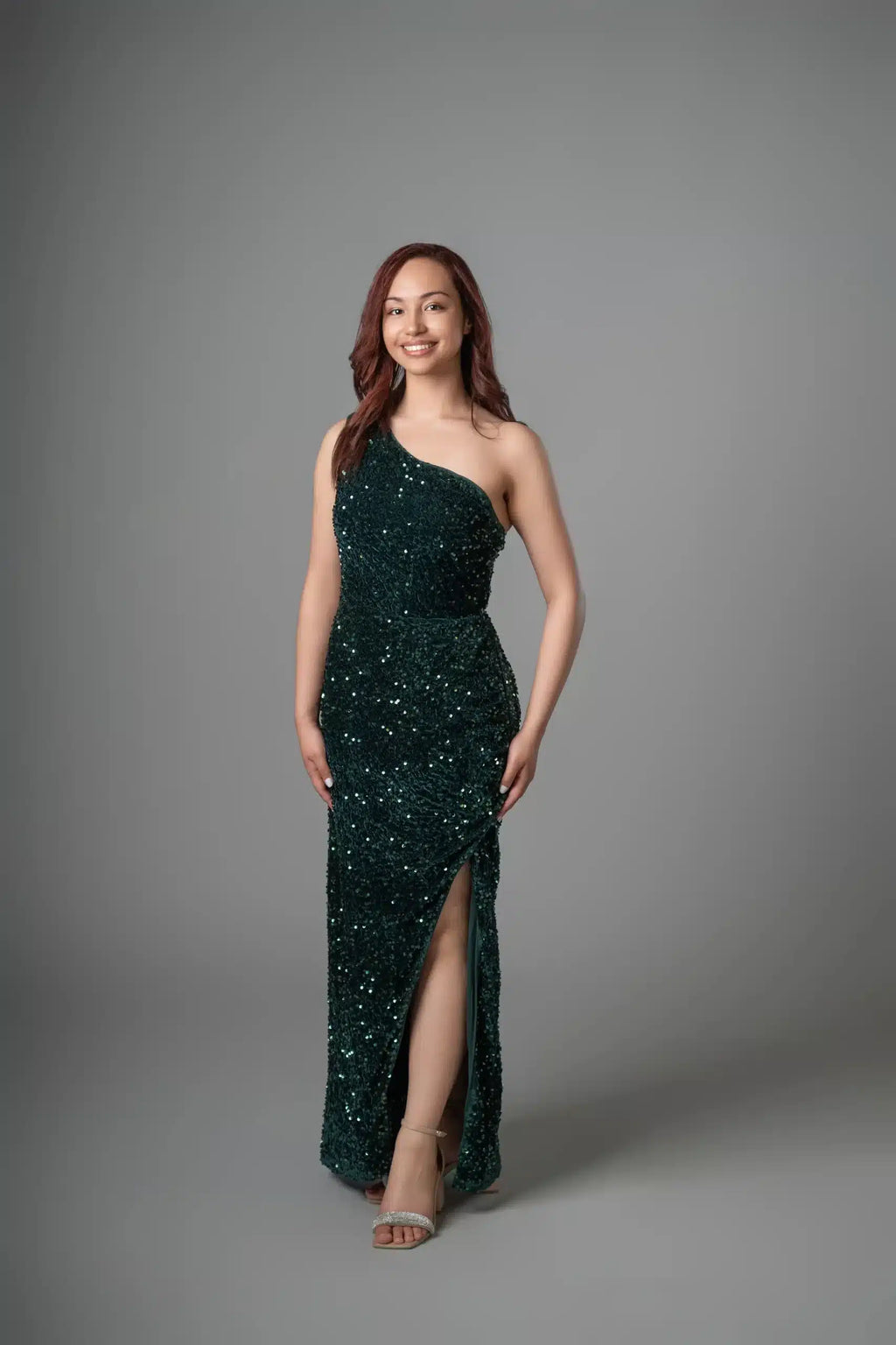 Forest green sequin one-shoulder dress with high leg slit, front view