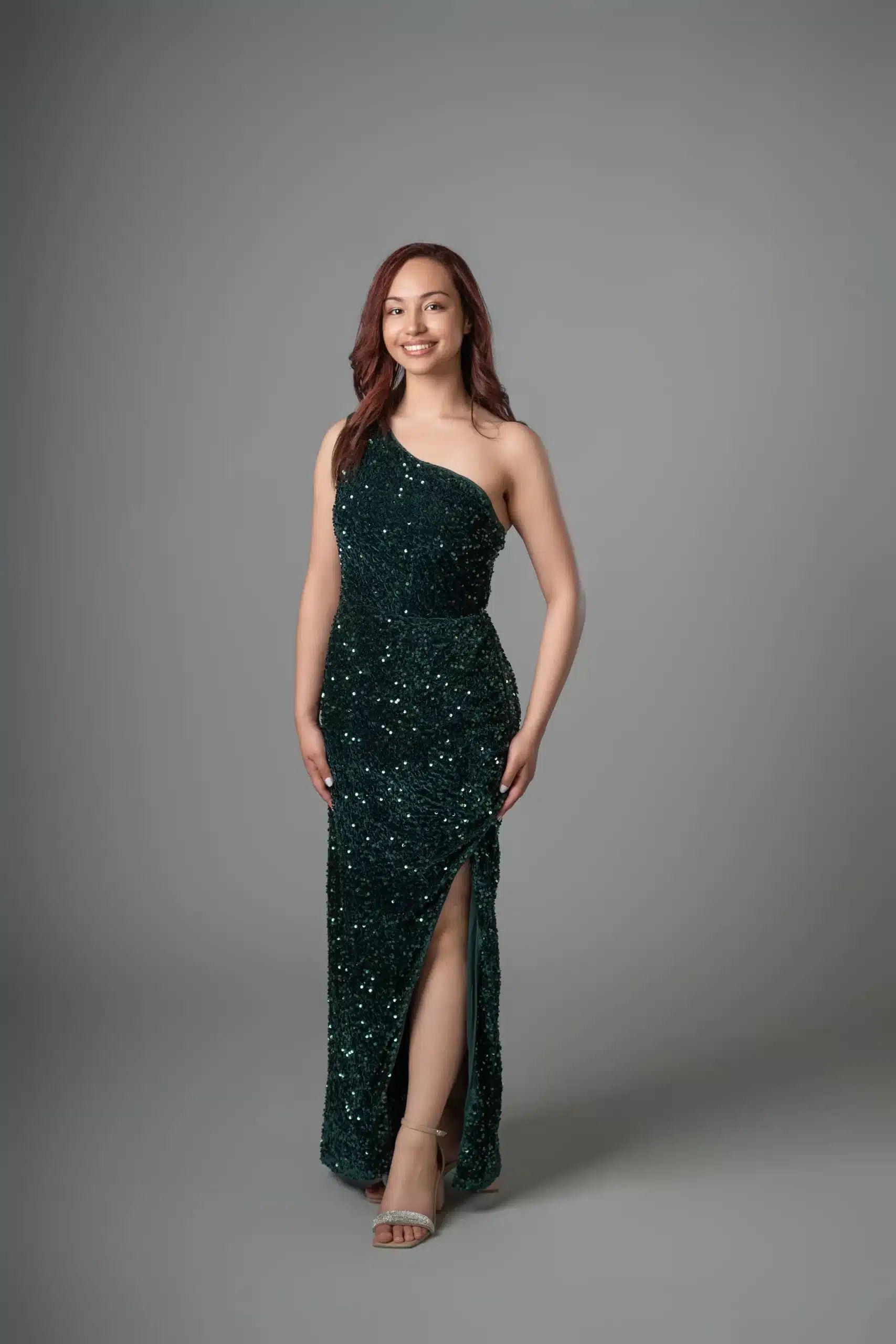 Forest green sequin one-shoulder dress with high leg slit, front view