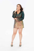 Model wearing deep V-neck sequin dress with teal and gold bodice and rose gold sequin mini skirt – Art Kollocsion
