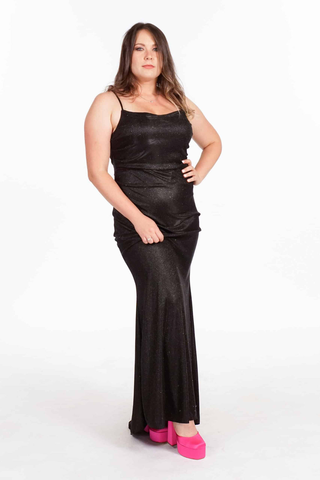 Black shimmery cowl neckline dress with form-fitting silhouette and maxi length