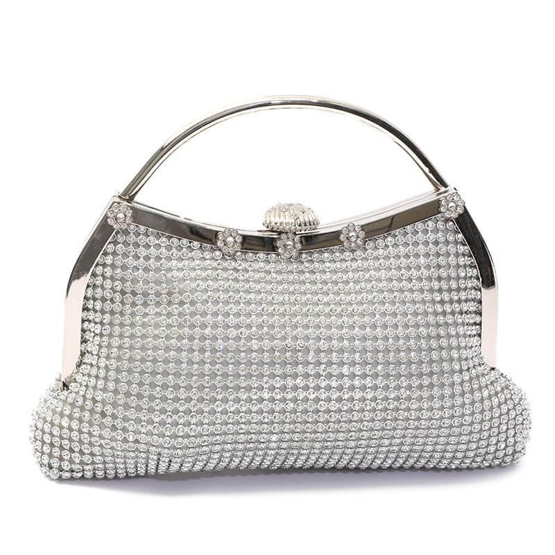 Silver crystal-covered clutch bag with rhinestone floral details and curved handle, full front view