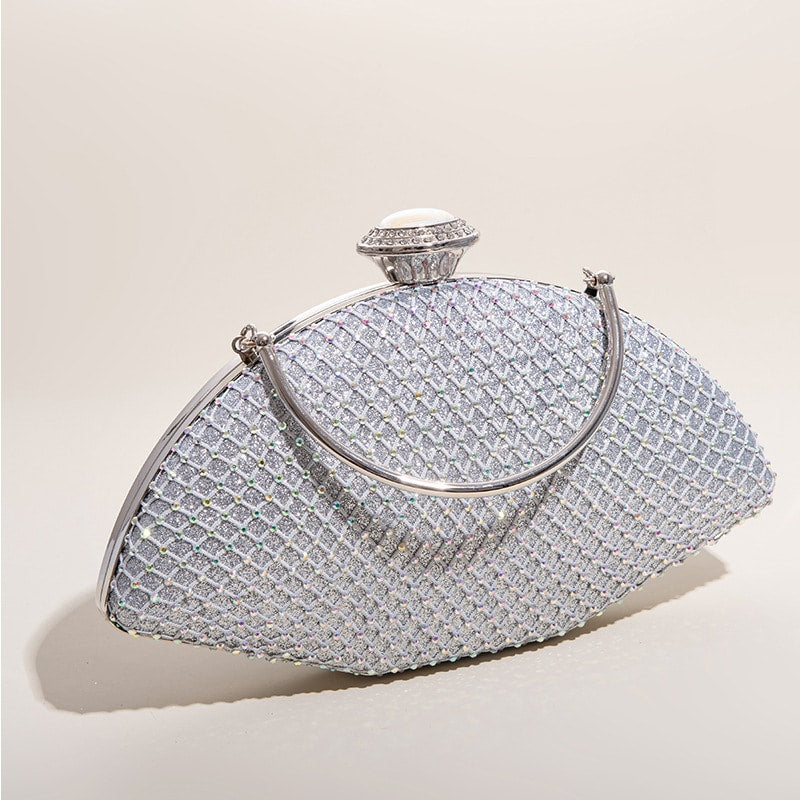 Silver crystal rhinestone clutch with silver arched handle and rhinestones