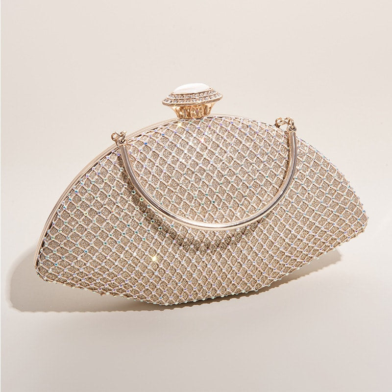 Rose gold rhinestone clutch with arched gold handle, structured quilted design