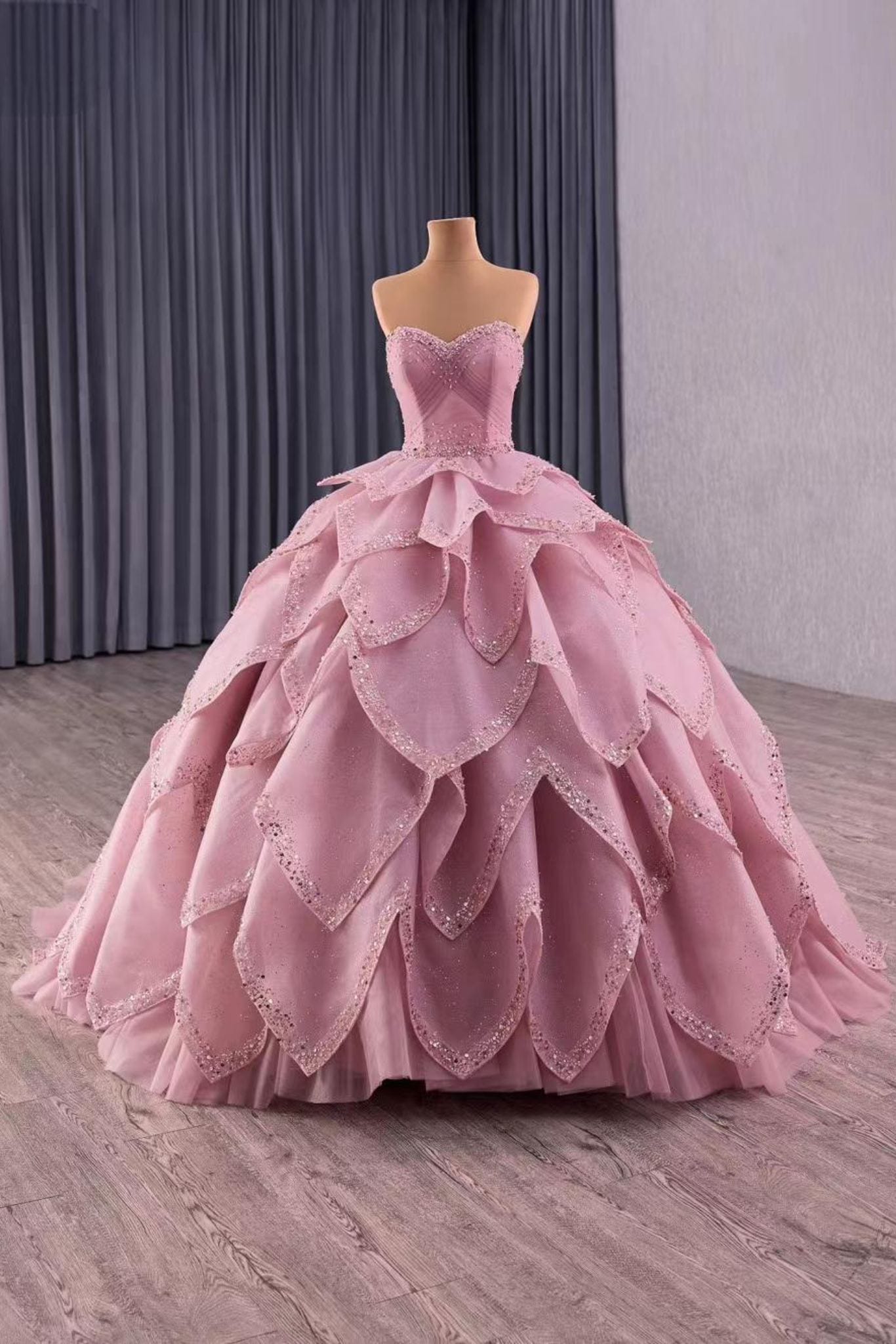 Custom made pink ball gown with sweetheart neckline and beaded petal-layered skirt, front view – Art Kollocsion Auckland